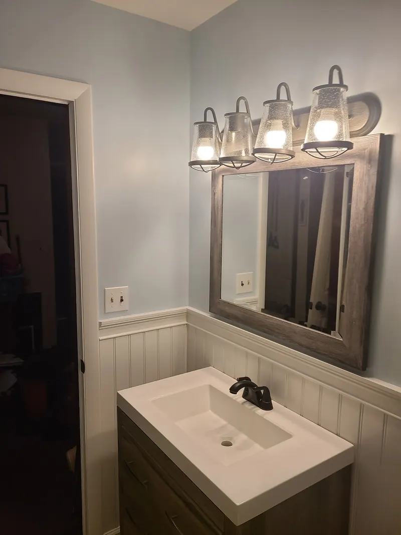 Bathroom vanity, lights and mirror