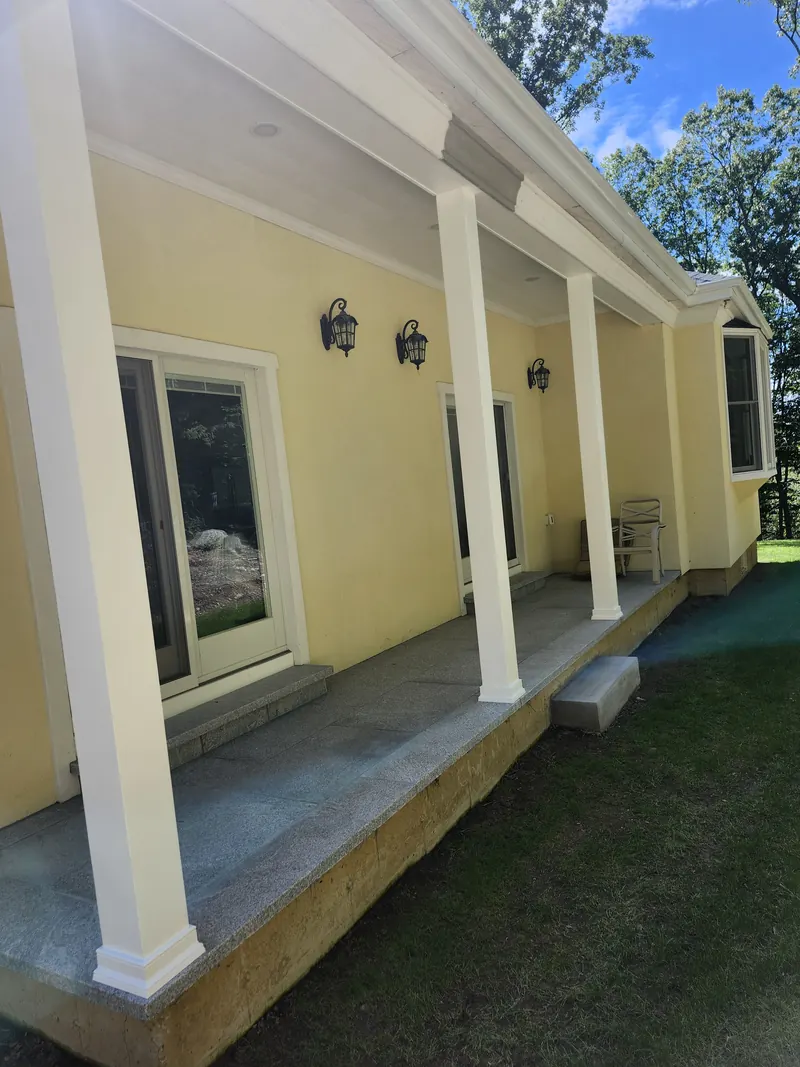 Covered porch columns and lantern lights