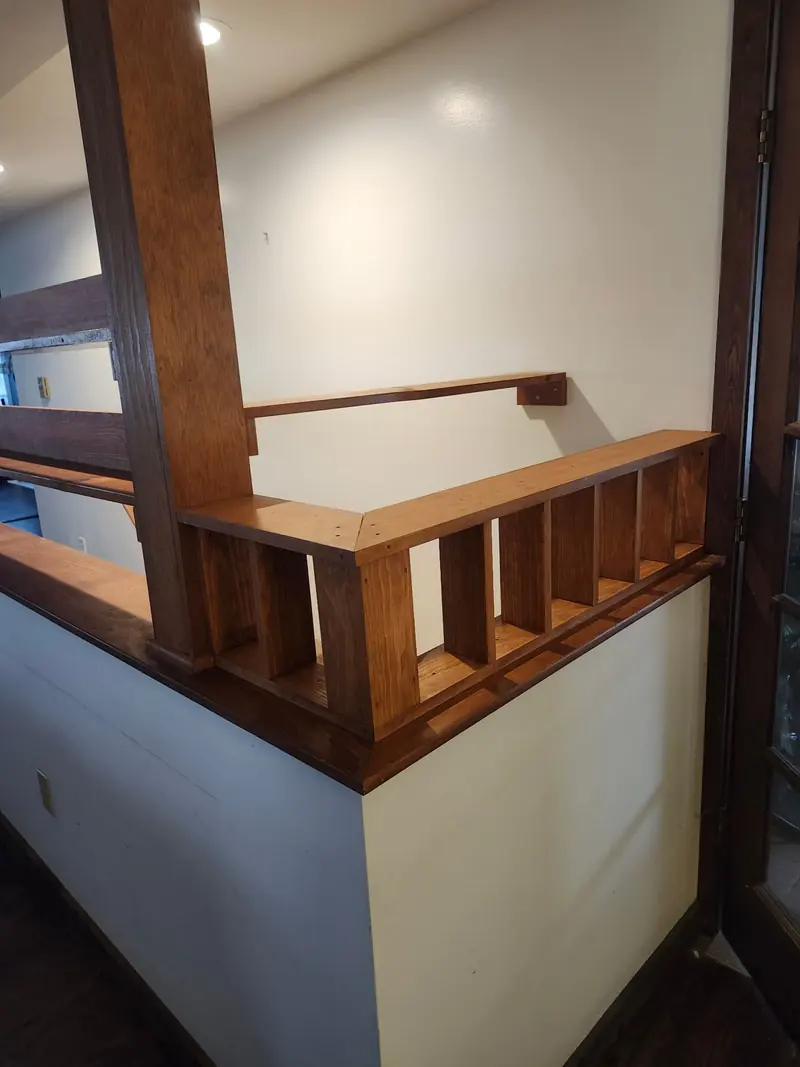 Oak stair rail detail built by Bontract